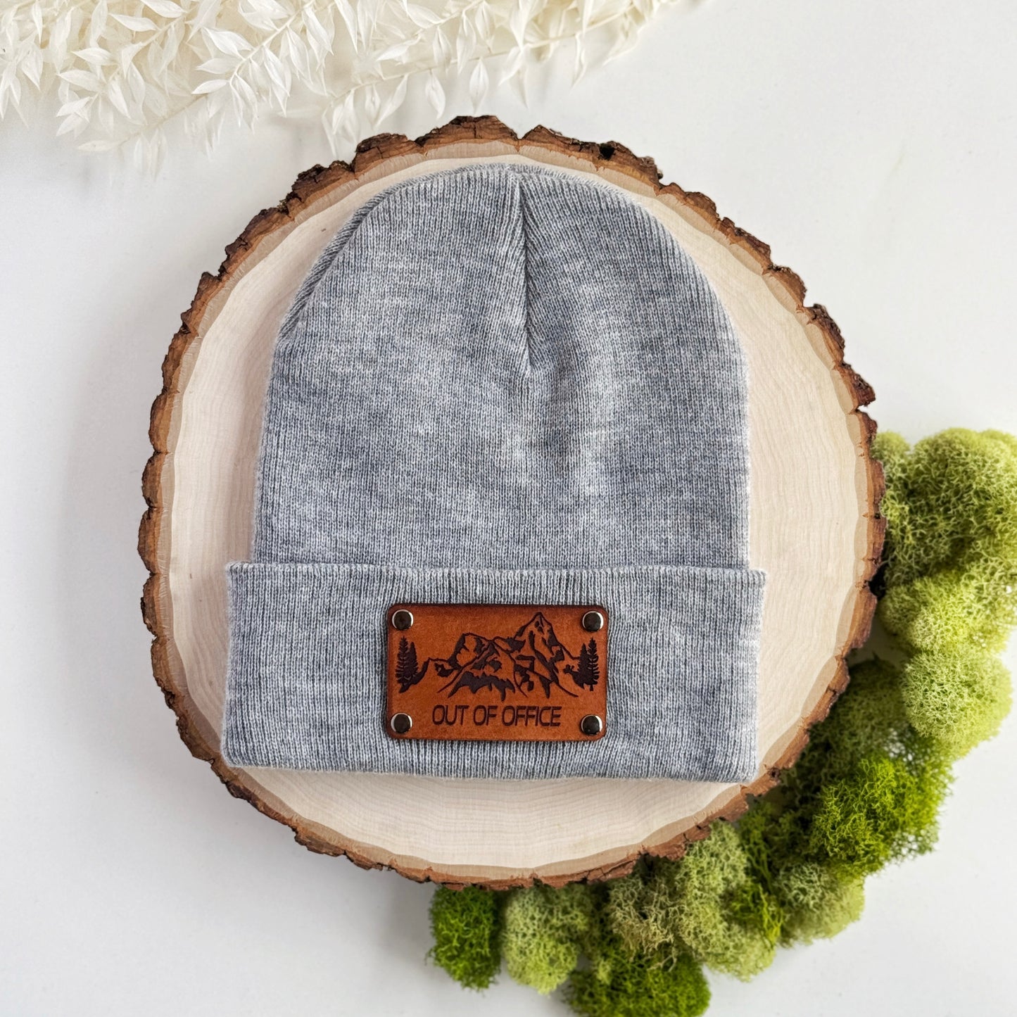 Out of Office Outdoors beanie with snap on/off leather patch