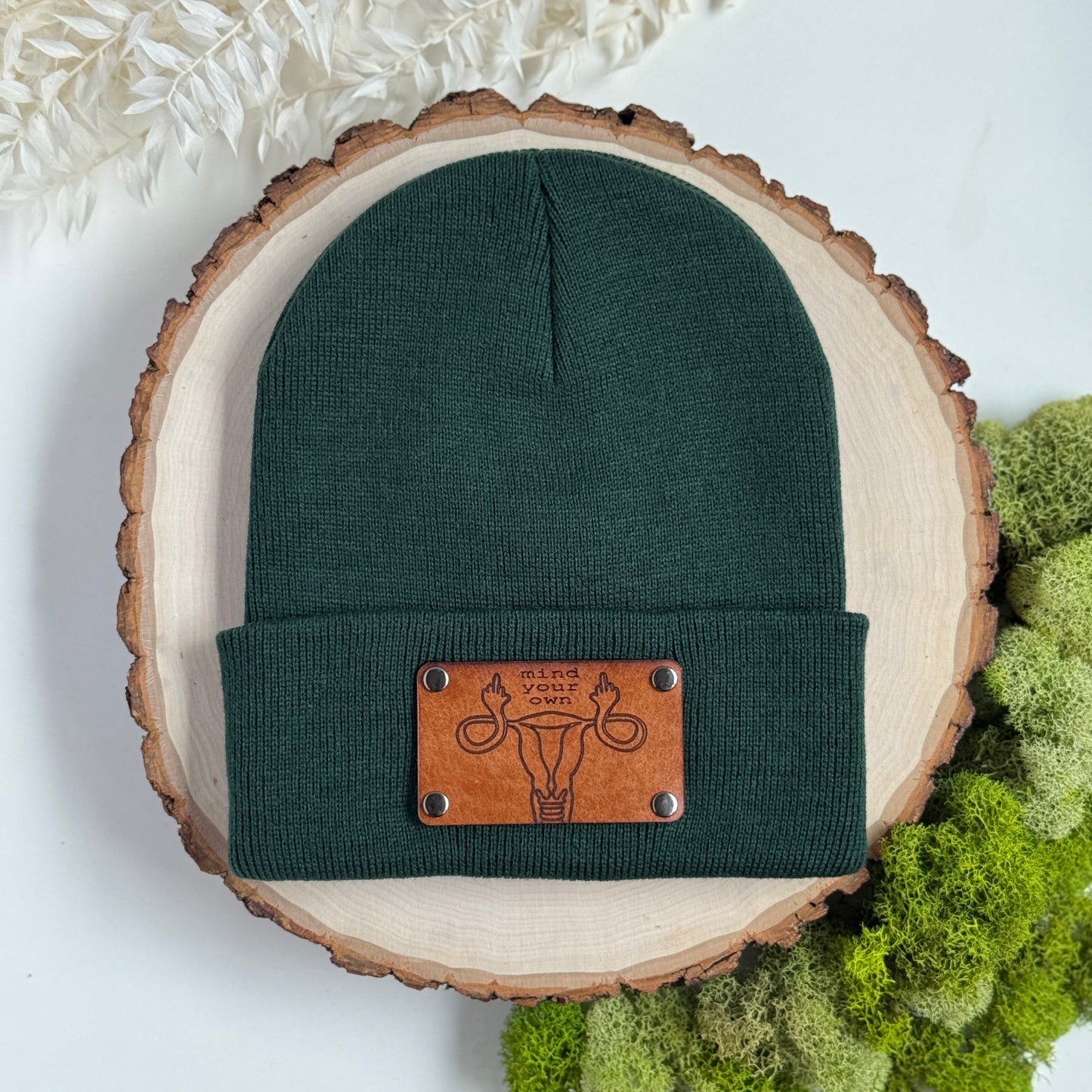 Mind Your Own Uterus beanie with snap on/off leather patch