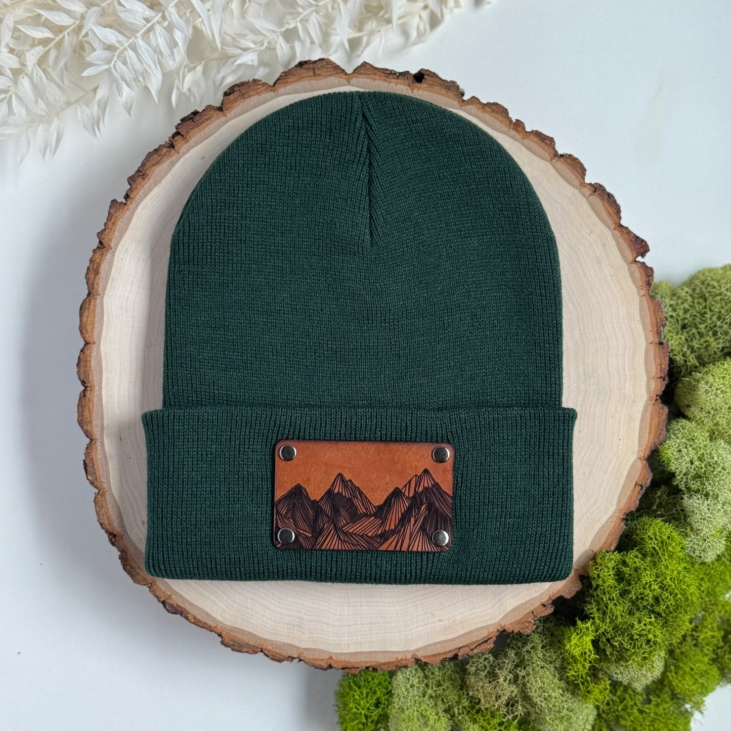 Mountain Peaks beanie with snap on/off leather patch