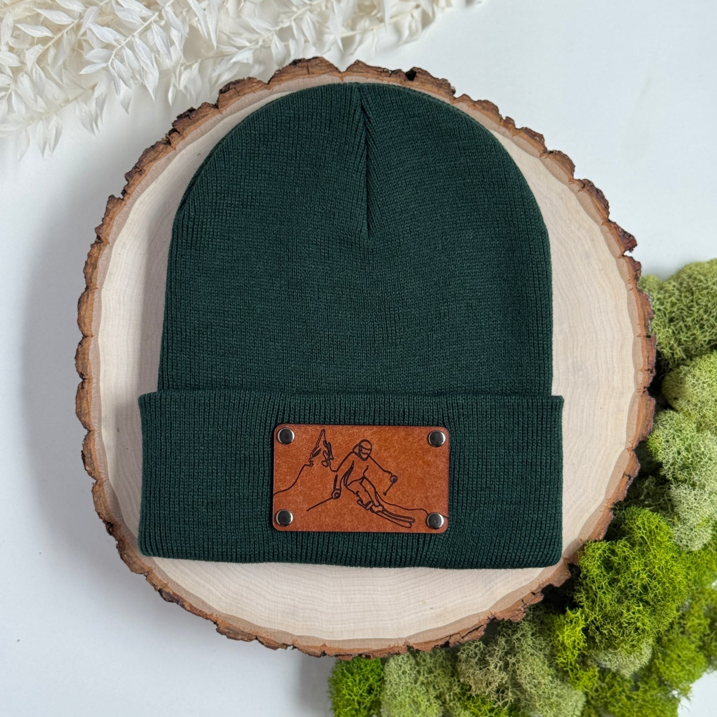 Skier beanie with snap on/off leather patch