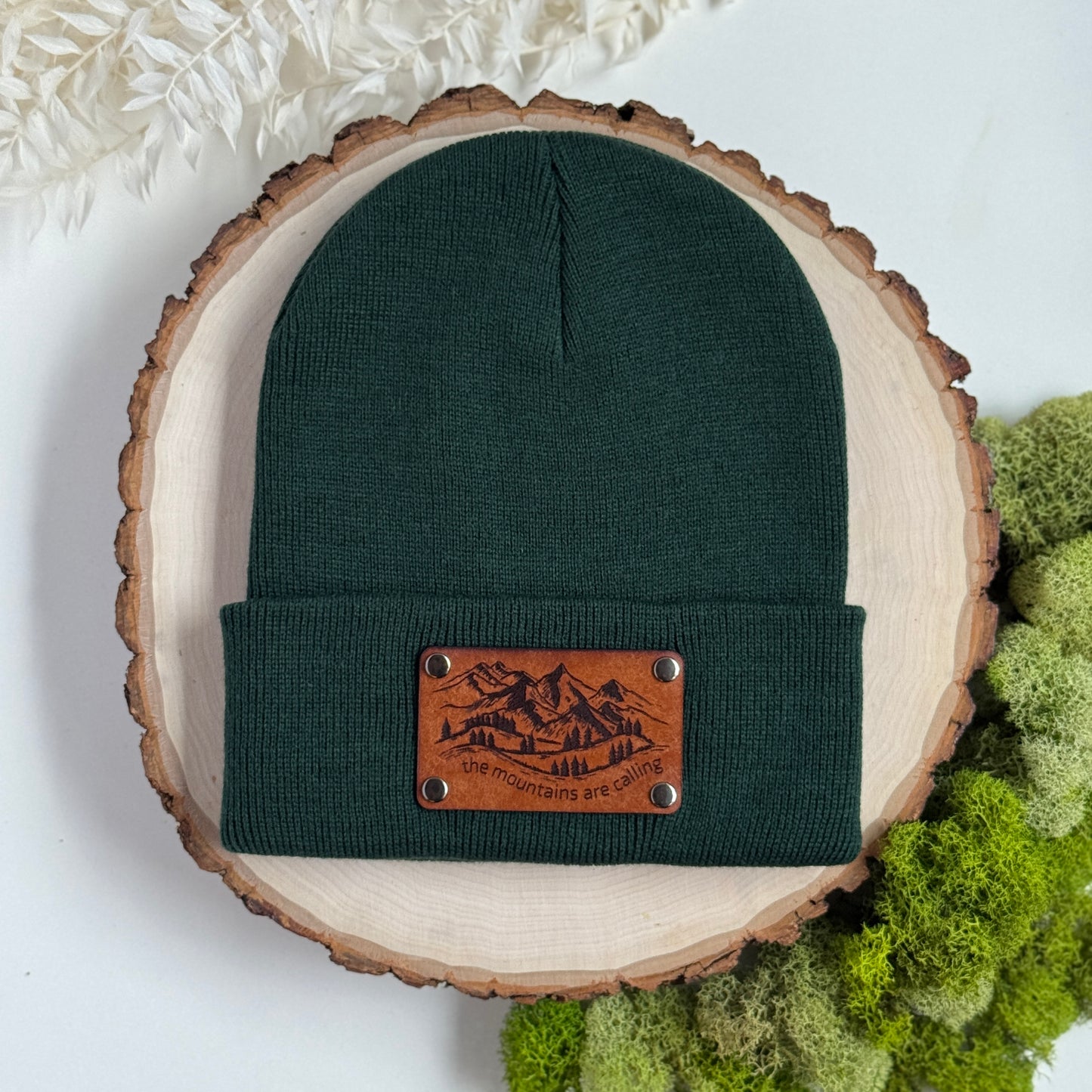 The Mountains Are Calling beanie with snap on/off leather patch