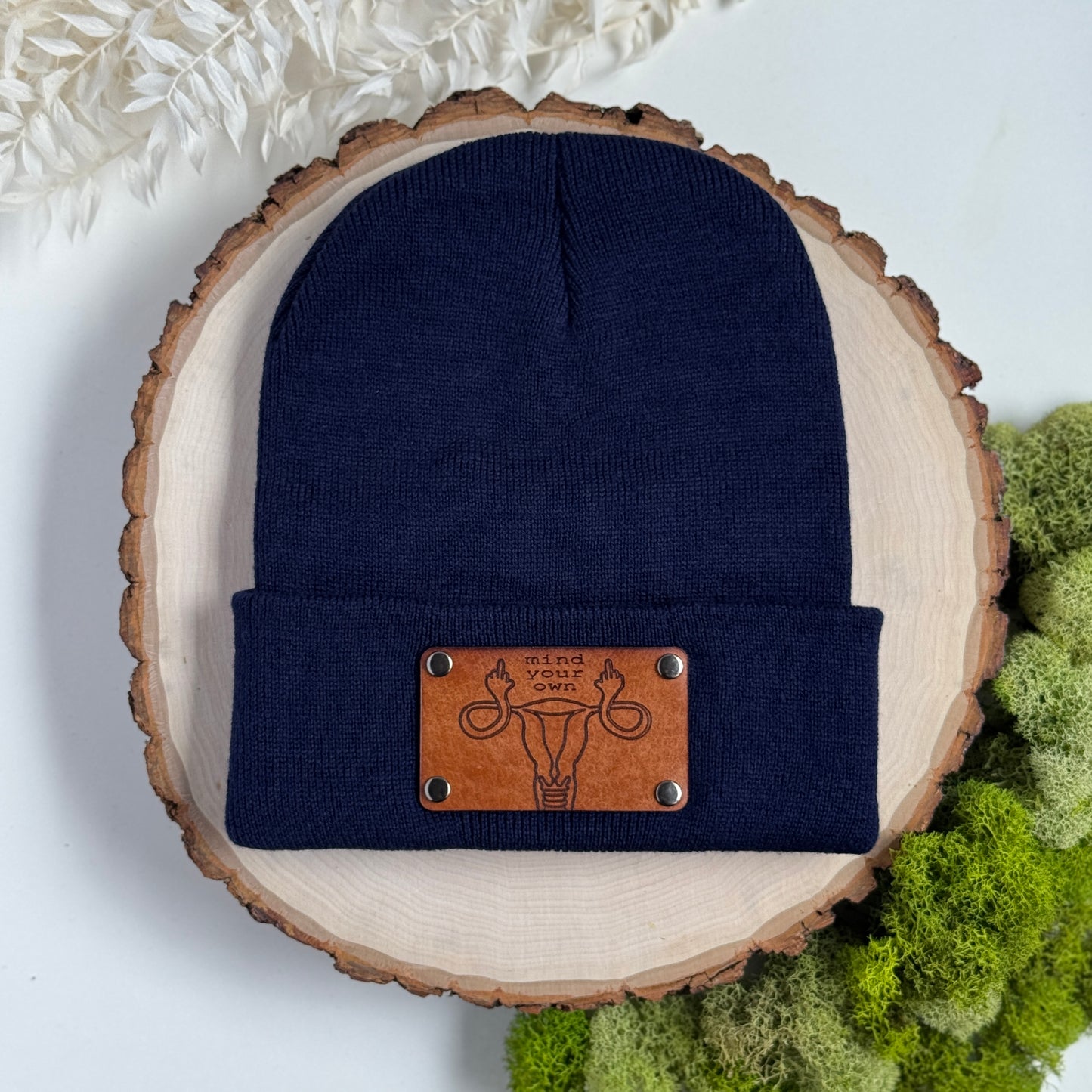 Mind Your Own Uterus beanie with snap on/off leather patch