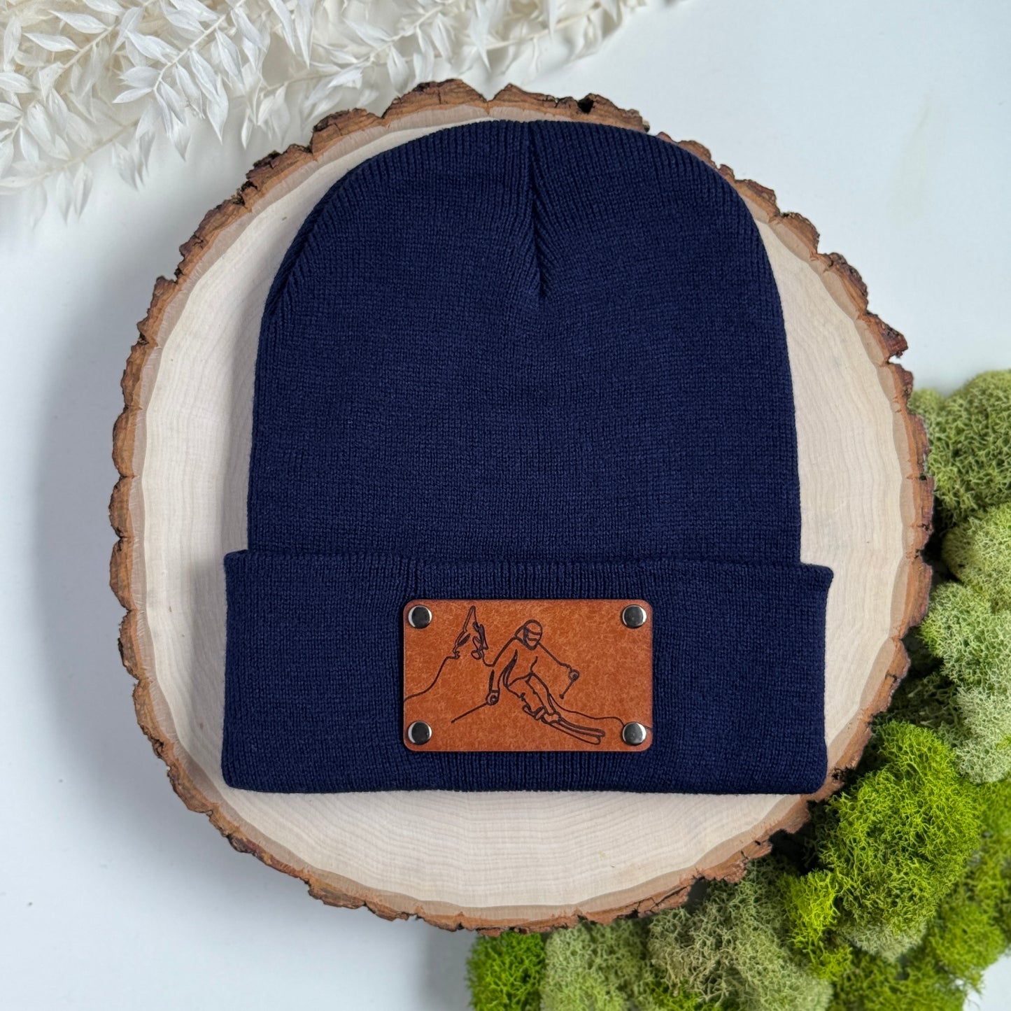 Skier beanie with snap on/off leather patch