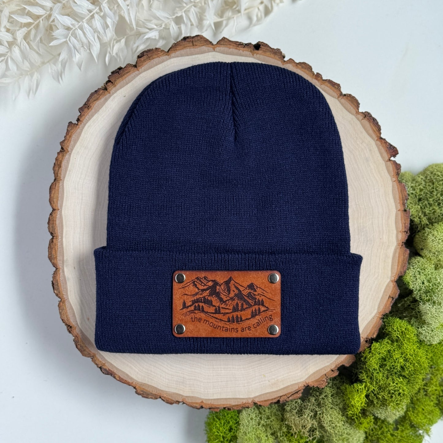 The Mountains Are Calling beanie with snap on/off leather patch