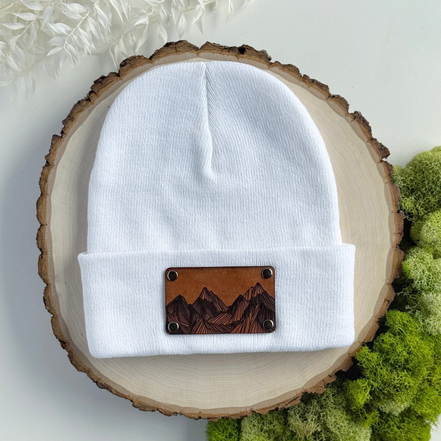 Mountain Peaks beanie with snap on/off leather patch