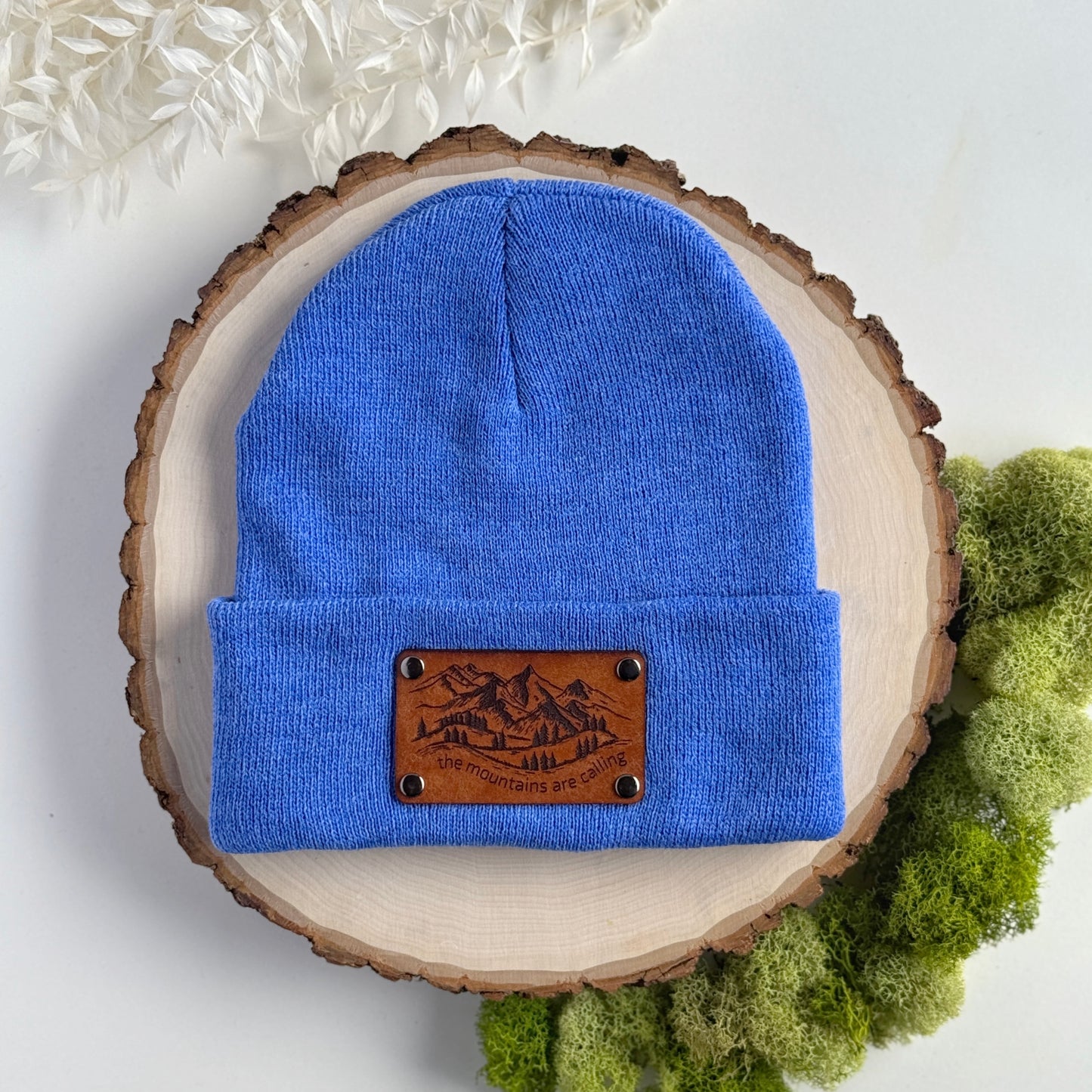 The Mountains Are Calling beanie with snap on/off leather patch