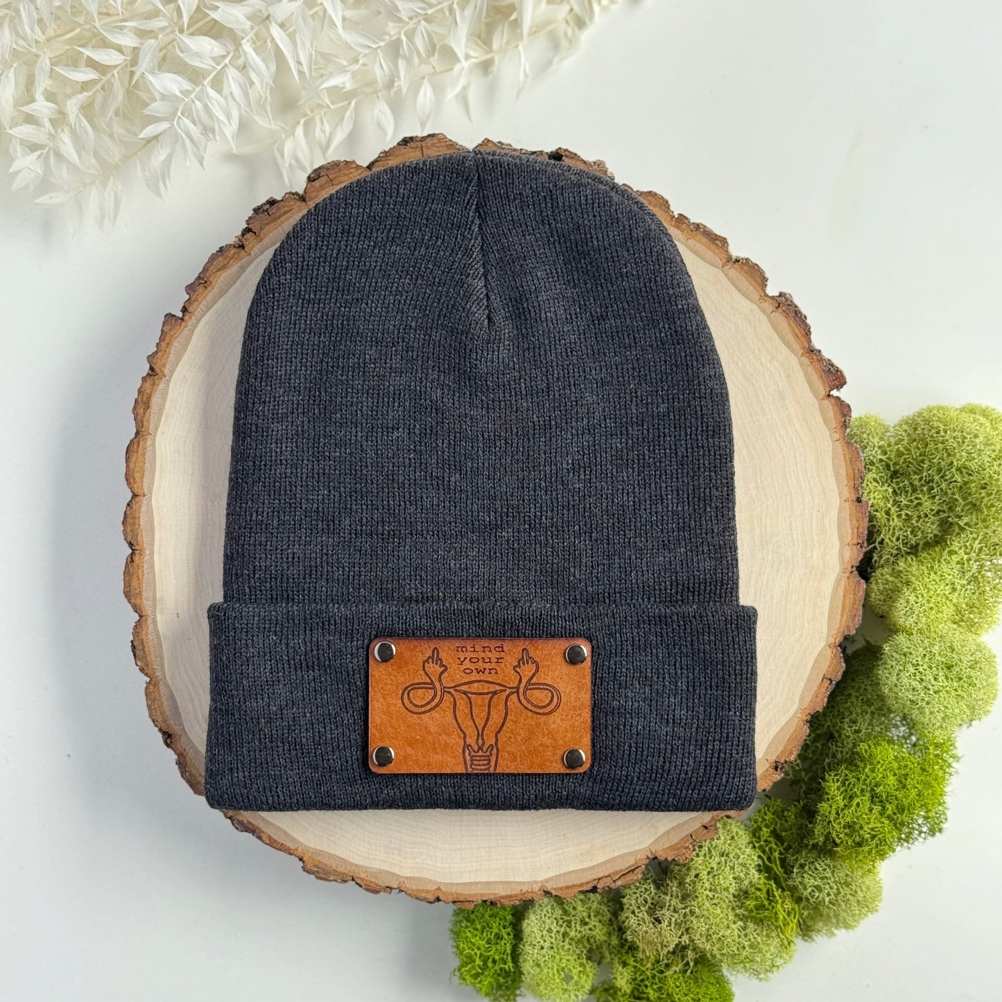 Mind Your Own Uterus beanie with snap on/off leather patch