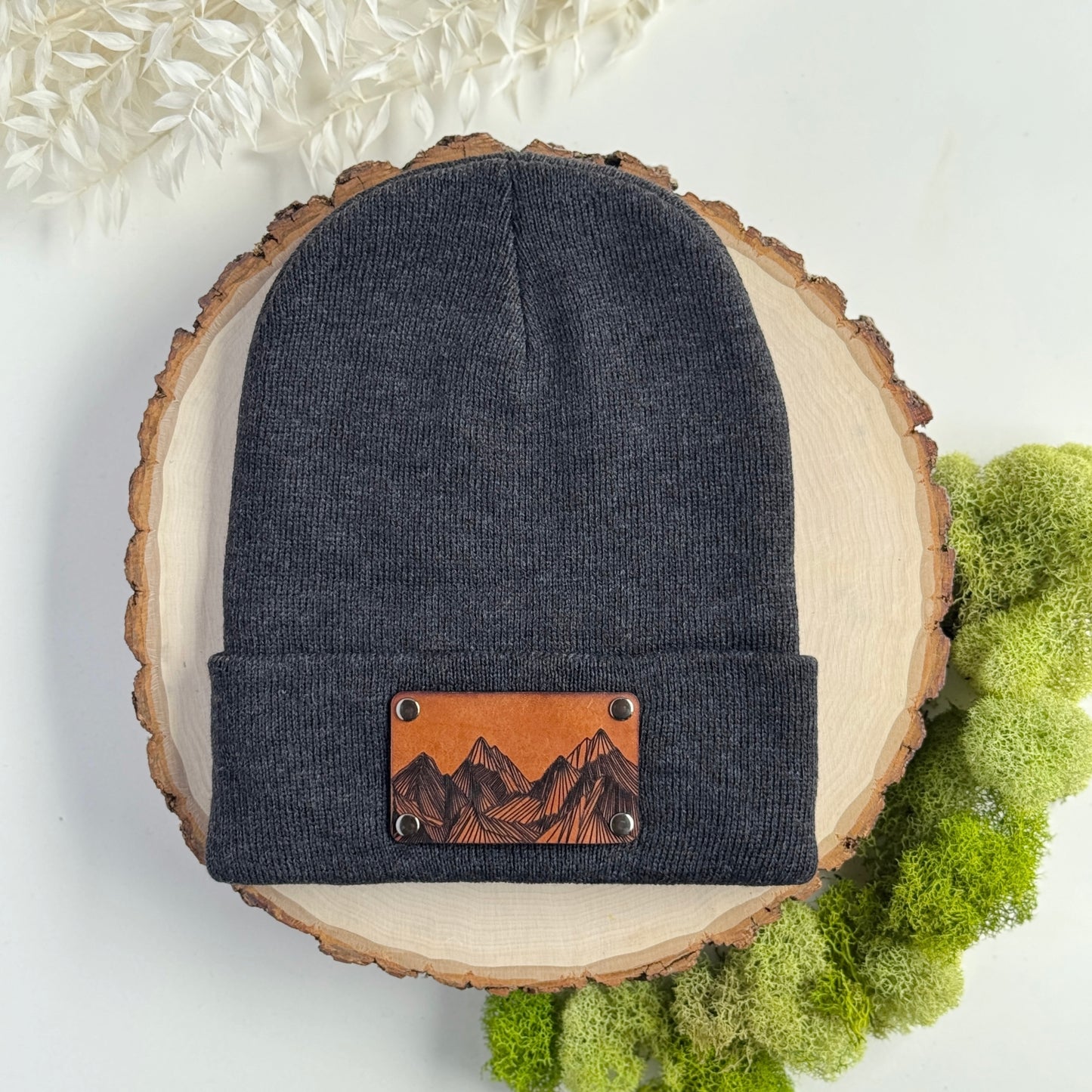 Mountain Peaks beanie with snap on/off leather patch