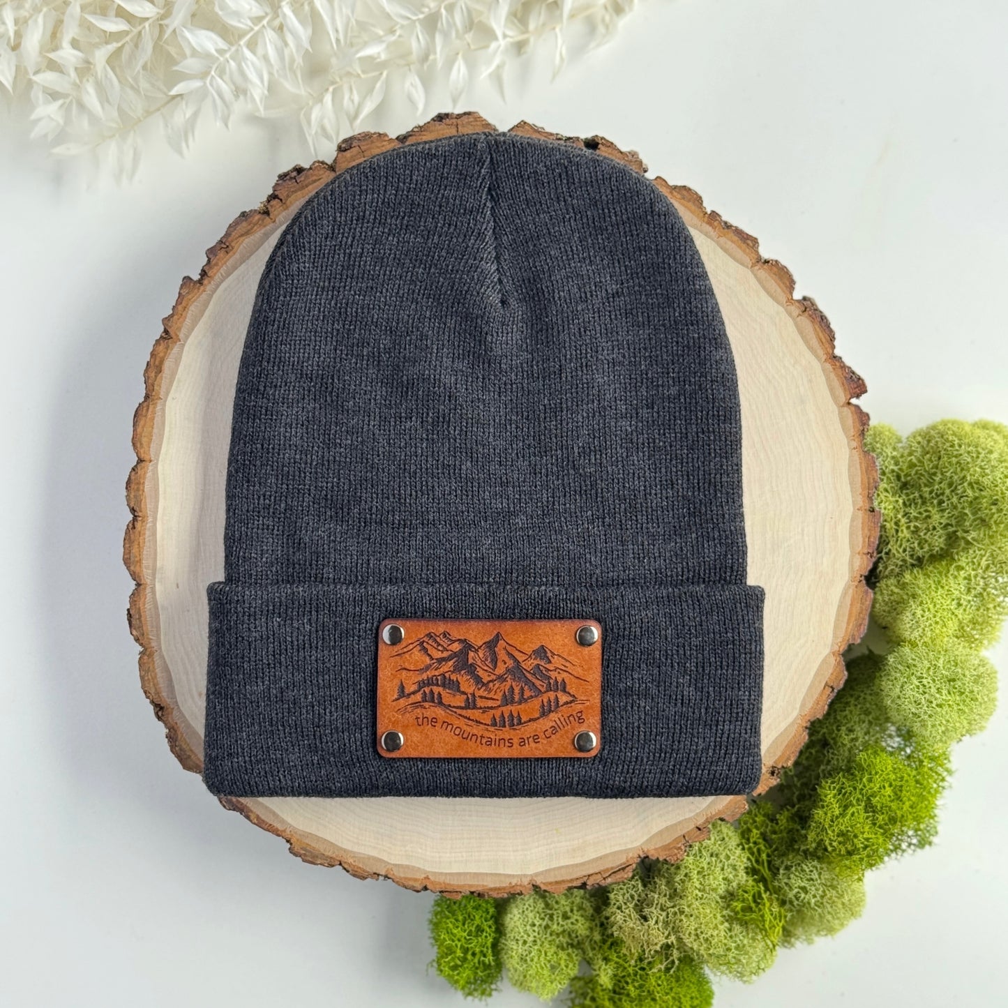 The Mountains Are Calling beanie with snap on/off leather patch