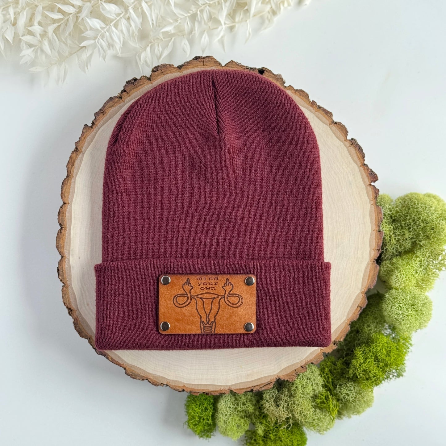 Mind Your Own Uterus beanie with snap on/off leather patch