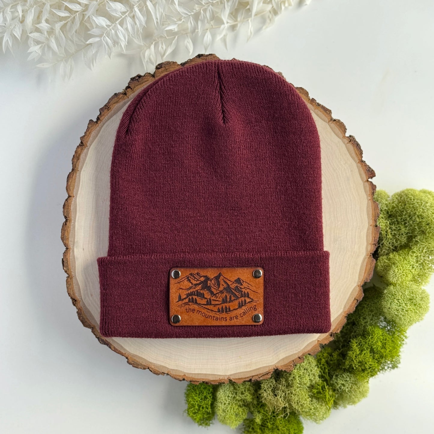 The Mountains Are Calling beanie with snap on/off leather patch