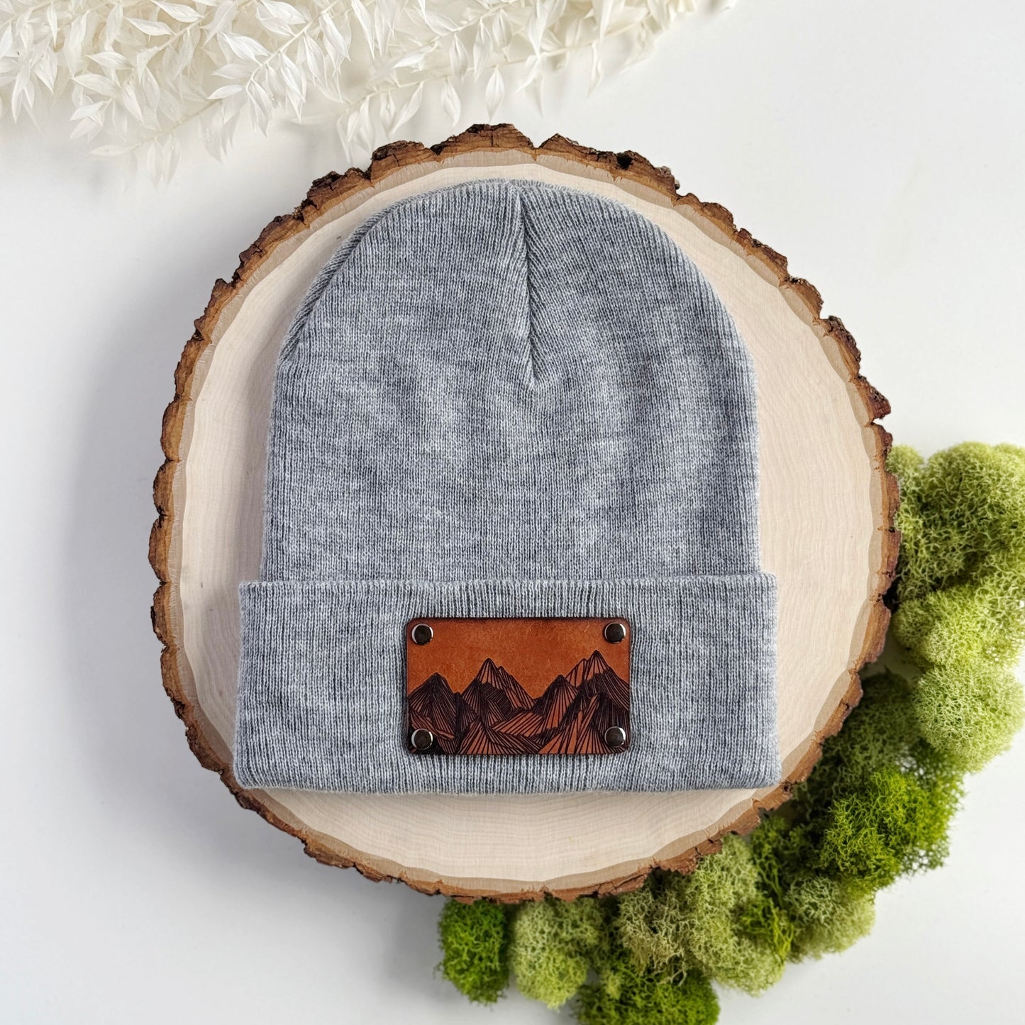 Mountain Peaks beanie with snap on/off leather patch