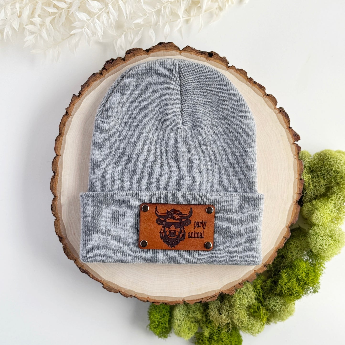 Party Animal beanie with snap on/off leather patch