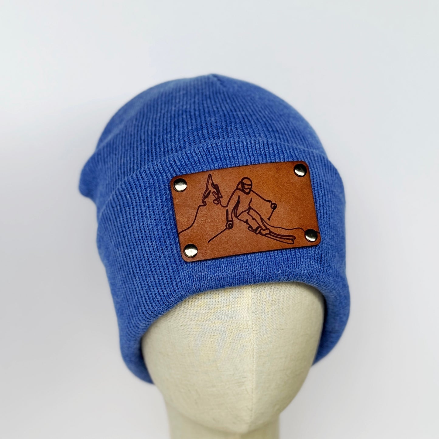 Skier beanie with snap on/off leather patch