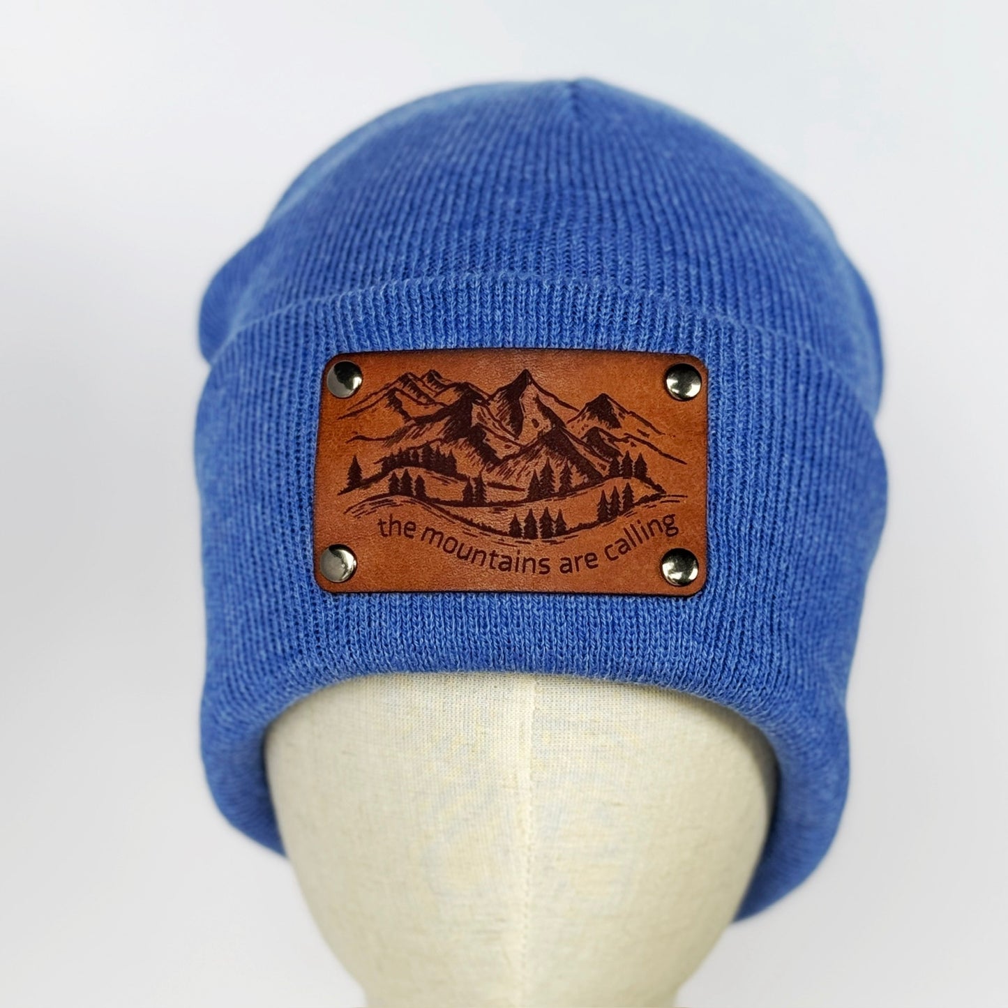 The Mountains Are Calling beanie with snap on/off leather patch