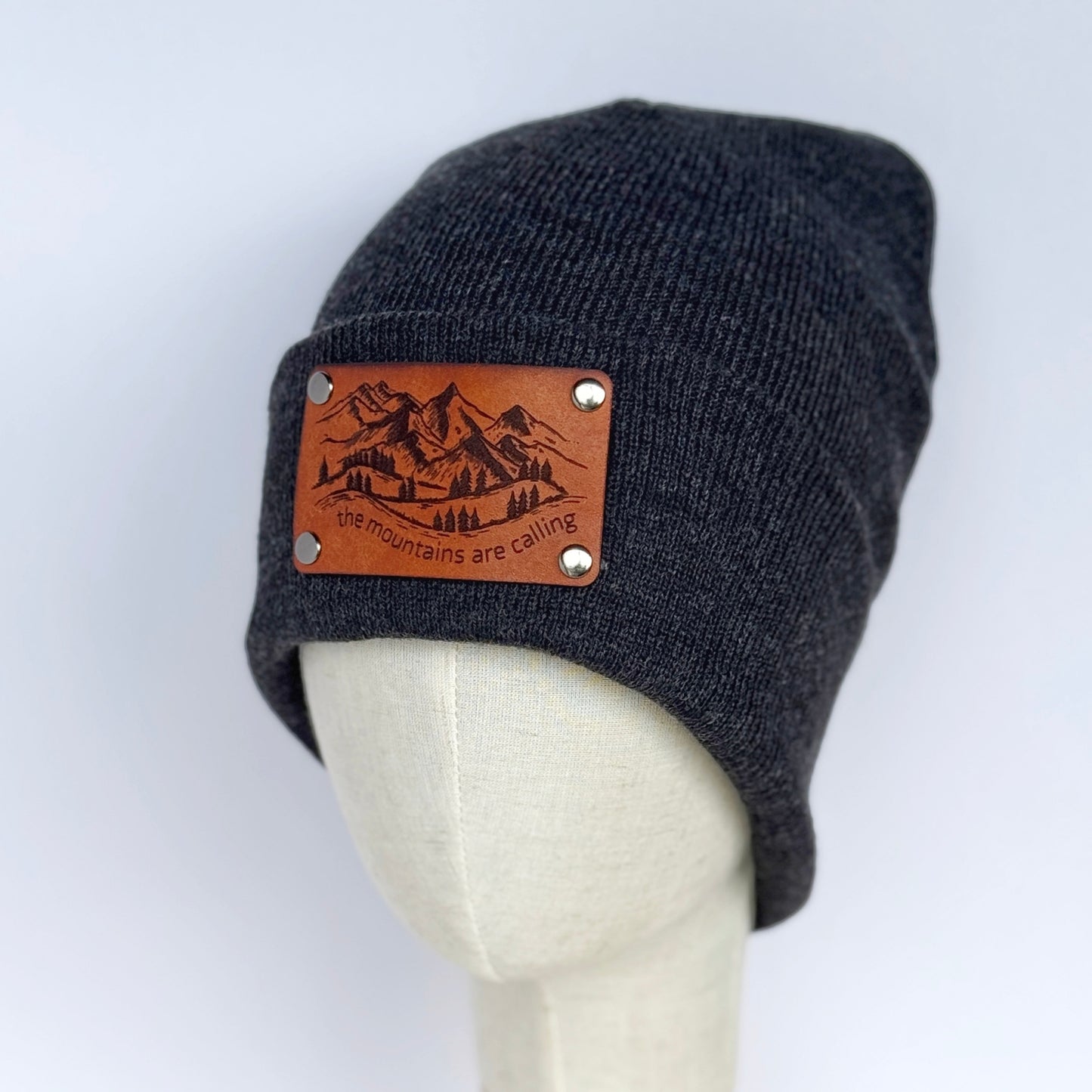 The Mountains Are Calling beanie with snap on/off leather patch