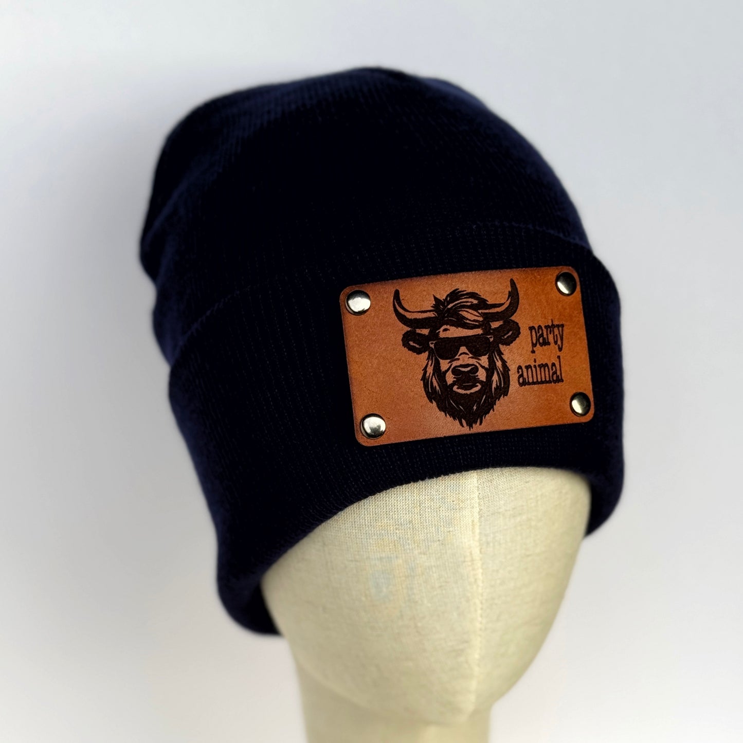 Party Animal beanie with snap on/off leather patch