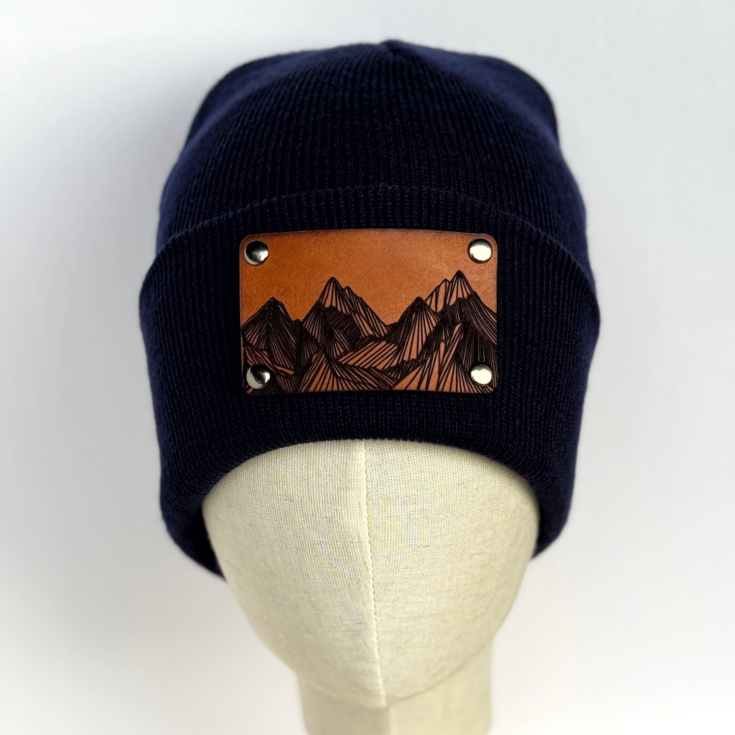 Mountain Peaks beanie with snap on/off leather patch