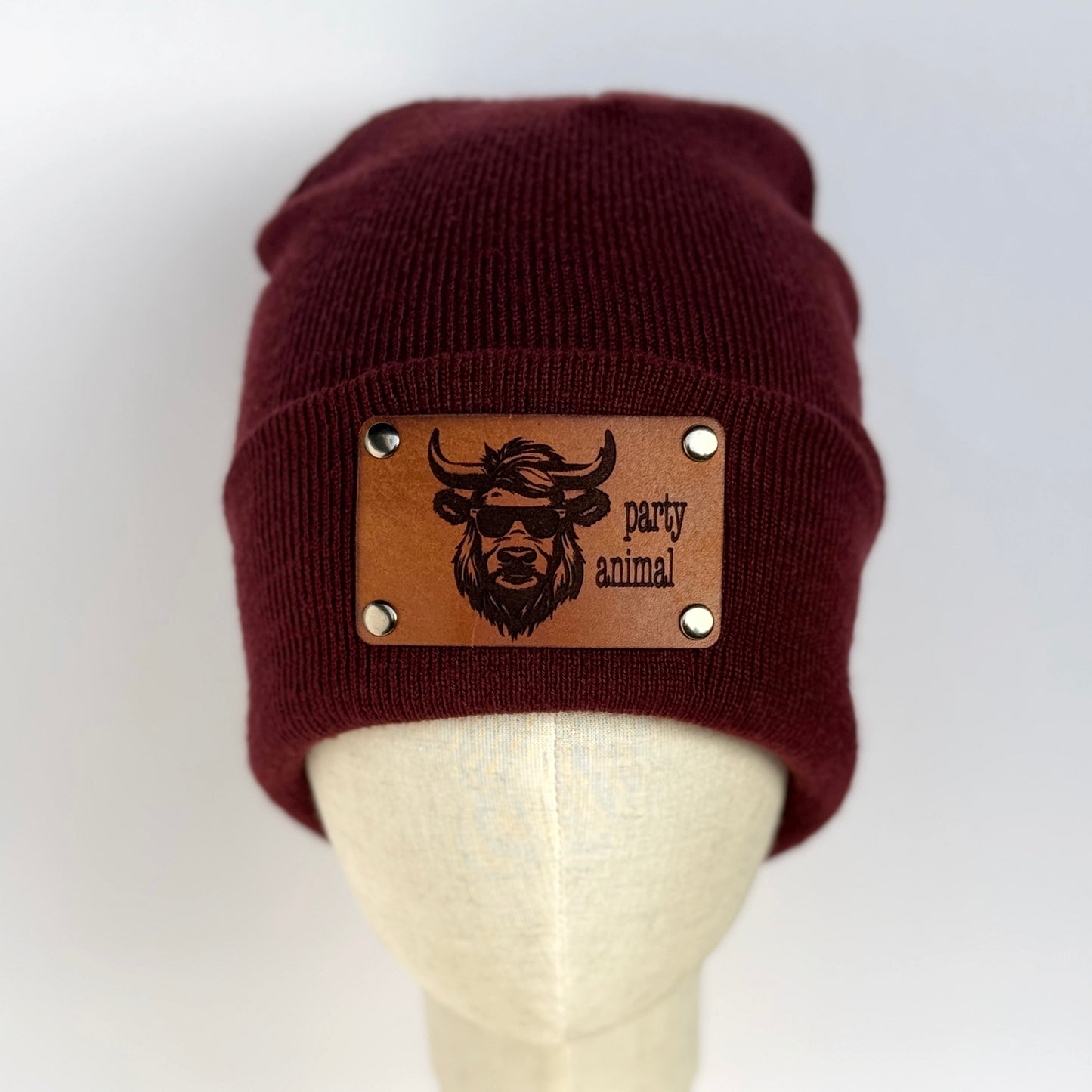 Party Animal beanie with snap on/off leather patch