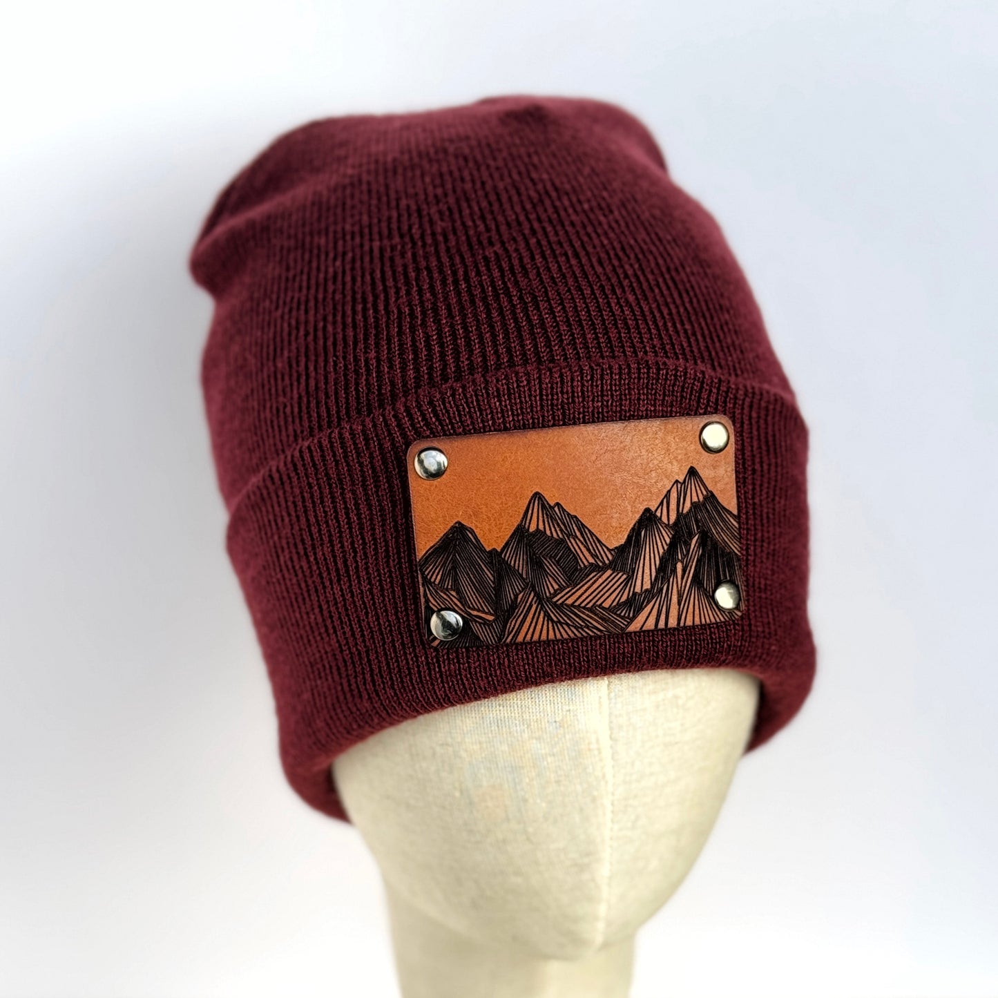 Mountain Peaks beanie with snap on/off leather patch